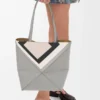 Bolso tote Puzzle Fold mediano en piel de becerro napa Gris/Light Ghost Bolso tote Puzzle Fold mediano en piel de becerro napa Gris/Light Ghost