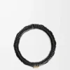 Brazalete tejido en latón y piel de becerro clásica. Negro Brazalete tejido en latón y piel de becerro clásica. Negro