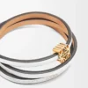 Brazalete Twist en piel de becerro blanco suave Brazalete Twist en piel de becerro blanco suave