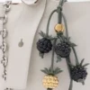 Berroza charm en piel de becerro clásica, negro/verde Berroza charm en piel de becerro clásica, negro/verde