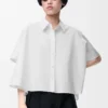 Camisa trapecio de manga corta en algodón blanco Camisa trapecio de manga corta en algodón blanco