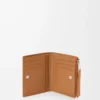 Cartera compacta y delgada Puzzle en piel de becerro granulada flexible Light Canyon Brown