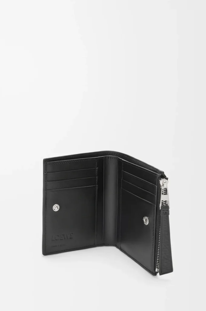 Cartera compacta y delgada Puzzle en piel de becerro granulada flexible. Negro