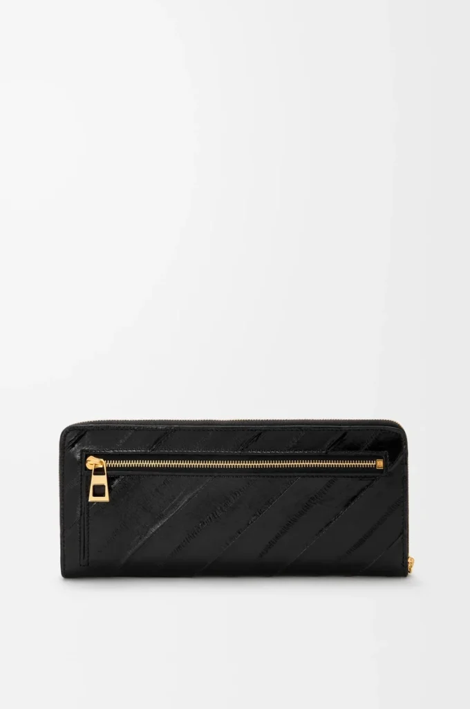 Cartera con cremallera alrededor y nudo en piel de anguila. Negro Cartera con cremallera alrededor y nudo en piel de anguila. Negro