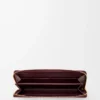 Cartera con cremallera y nudo en piel de anguila Dark Burgundy Cartera con cremallera y nudo en piel de anguila Dark Burgundy