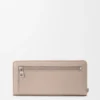 Cartera con cremallera y nudo en piel de becerro napa brillante Clay/Plum Cartera con cremallera y nudo en piel de becerro napa brillante Clay/Plum