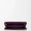 Cartera con cremallera y nudo en piel de becerro napa brillante Clay/Plum Cartera con cremallera y nudo en piel de becerro napa brillante Clay/Plum