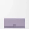 Cartera continental Anagram en piel de becerro granulada Dirty Mauve Cartera continental Anagram en piel de becerro granulada Dirty Mauve