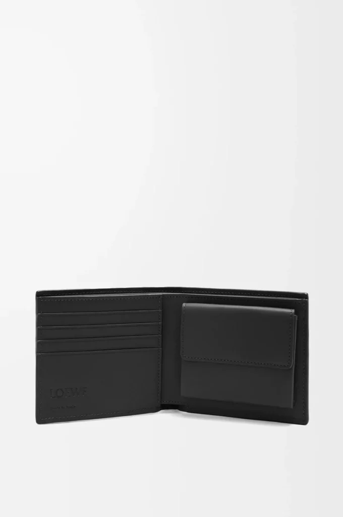Cartera doble para monedas en piel de becerro clásica texturizada, color negro. Cartera doble para monedas en piel de becerro clásica texturizada, color negro.