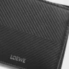 Cartera doble para monedas en piel de becerro clásica texturizada, color negro. Cartera doble para monedas en piel de becerro clásica texturizada, color negro.