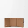 Cartera plegable Pebble en piel de becerro granulado color moca Cartera plegable Pebble en piel de becerro granulado color moca