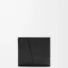 Cartera plegable Puzzle para monedas en piel de becerro clásica. Negro Cartera plegable Puzzle para monedas en piel de becerro clásica. Negro