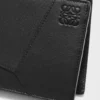 Cartera plegable Puzzle para monedas en piel de becerro clásica. Negro Cartera plegable Puzzle para monedas en piel de becerro clásica. Negro