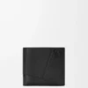 Cartera plegable Puzzle para monedas en piel de becerro granulada flexible, color negro Cartera plegable Puzzle para monedas en piel de becerro granulada flexible, color negro