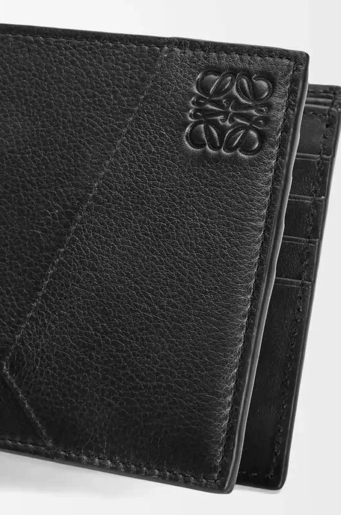Cartera Puzzle con doble pliegue en piel de becerro clásica negra Cartera Puzzle con doble pliegue en piel de becerro clásica negra