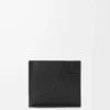 Cartera Puzzle con doble pliegue en piel de becerro granulada flexible, color negro Cartera Puzzle con doble pliegue en piel de becerro granulada flexible, color negro