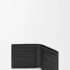 Cartera Puzzle con doble pliegue en piel de becerro granulada flexible, color negro Cartera Puzzle con doble pliegue en piel de becerro granulada flexible, color negro