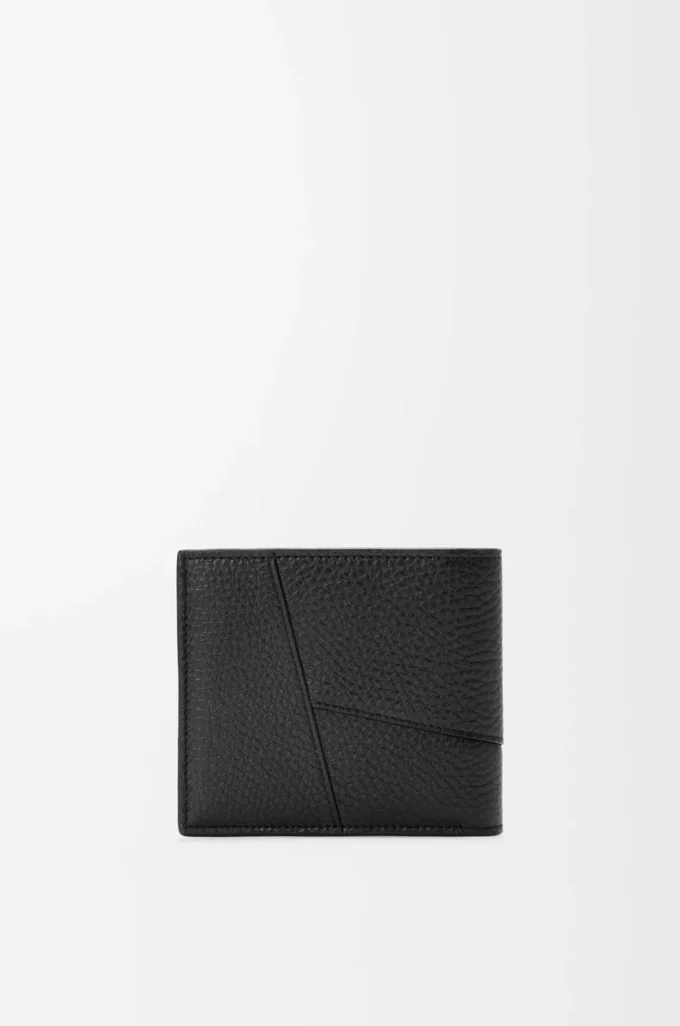 Cartera Puzzle con doble pliegue en piel de becerro granulada flexible, color negro Cartera Puzzle con doble pliegue en piel de becerro granulada flexible, color negro