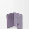 Cartera vertical pequeña Anagram en piel de becerro granulada Dirty Mauve