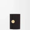 Cartera vertical pequeña Pebble en piel de becerro napa brillante Black Cartera vertical pequeña Pebble en piel de becerro napa brillante Black