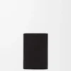 Cartera vertical pequeña Pebble en piel de becerro napa brillante Black Cartera vertical pequeña Pebble en piel de becerro napa brillante Black
