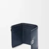 Cartera vertical pequeña Puffer Anagram en piel de becerro napa brillante azul marino oscuro Cartera vertical pequeña Puffer Anagram en piel de becerro napa brillante azul marino oscuro