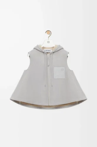 Chaleco con capucha en piel de oveja gris claro jaspeado