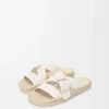 Chanclas espadrilles con forma de pétalo en suave piel de becerro. Blanco