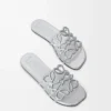 Chanclas Petal Anagram de piel de cordero laminada. Color plata. Chanclas Petal Anagram de piel de cordero laminada. Color plata.