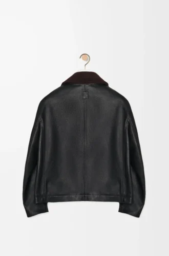 Chaqueta bomber de piel de cordero napa. Negro/Marrón.
