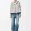 Chaqueta con capucha en piel de oveja gris claro jaspeado Chaqueta con capucha en piel de oveja gris claro jaspeado