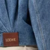 Chaqueta drapeada en denim azul índigo Chaqueta drapeada en denim azul índigo