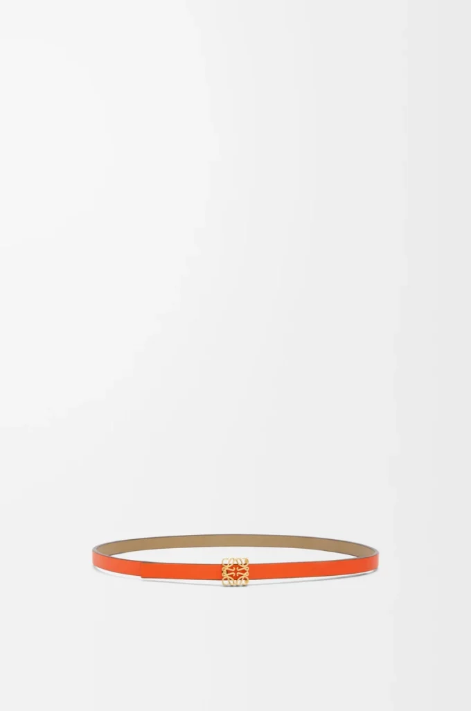 Cinturón reversible con cubo Anagram en piel de becerro lisa, color verde arcilla/naranja vivo/dorado Cinturón reversible con cubo Anagram en piel de becerro lisa, color verde arcilla/naranja vivo/dorado