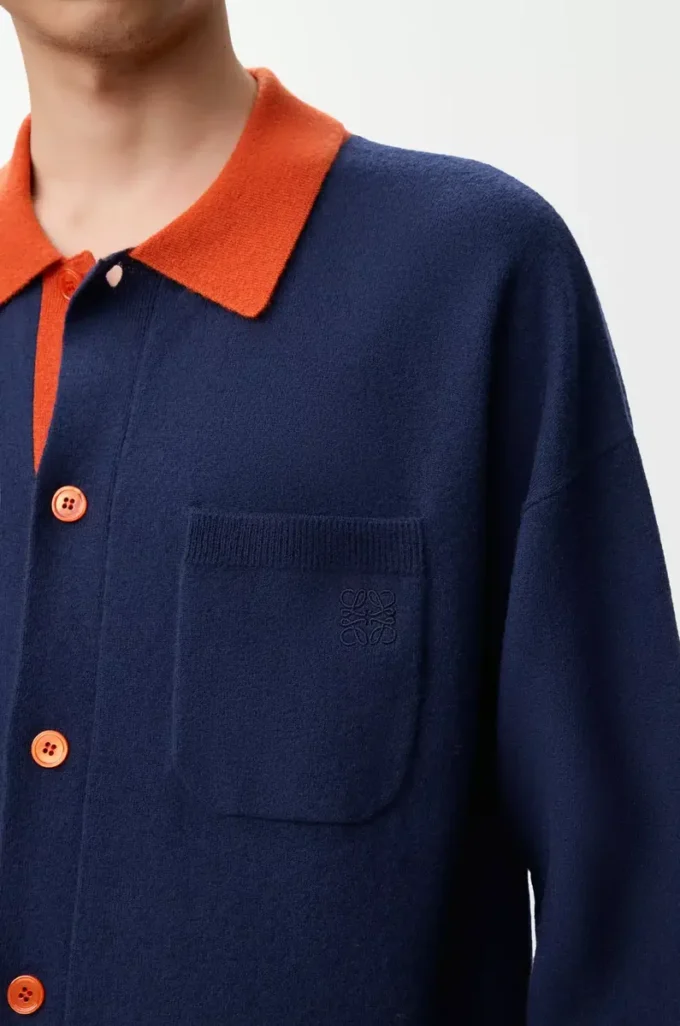 Cárdigan polo de lana azul marino/naranja Cárdigan polo de lana azul marino/naranja