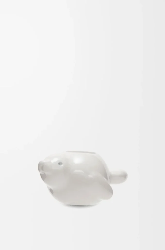 Dados con forma de foca en latón blanco suave Dados con forma de foca en latón blanco suave