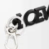 Dije LOEWE Signature en piel de becerro lisa. Negro
