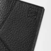 Funda para pasaporte Puzzle en piel de becerro granulada flexible. Color negro. Funda para pasaporte Puzzle en piel de becerro granulada flexible. Color negro.