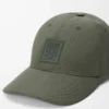 Gorra con parche de lona verde caqui Gorra con parche de lona verde caqui