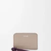 Monedero con cremallera en piel de becerro napa brillante Clay/Plum Monedero con cremallera en piel de becerro napa brillante Clay/Plum