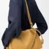 Monedero Flamenco mediano en piel de cordero napa suave color Sahara Monedero Flamenco mediano en piel de cordero napa suave color Sahara