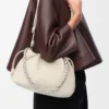Monedero Flamenco mediano en piel de cordero napa suave Sea Salt Monedero Flamenco mediano en piel de cordero napa suave Sea Salt