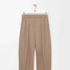 Pantalones acampanados de lana color arena Pantalones acampanados de lana color arena