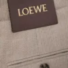 Pantalones con cinturón de lana Beige Melange Pantalones con cinturón de lana Beige Melange