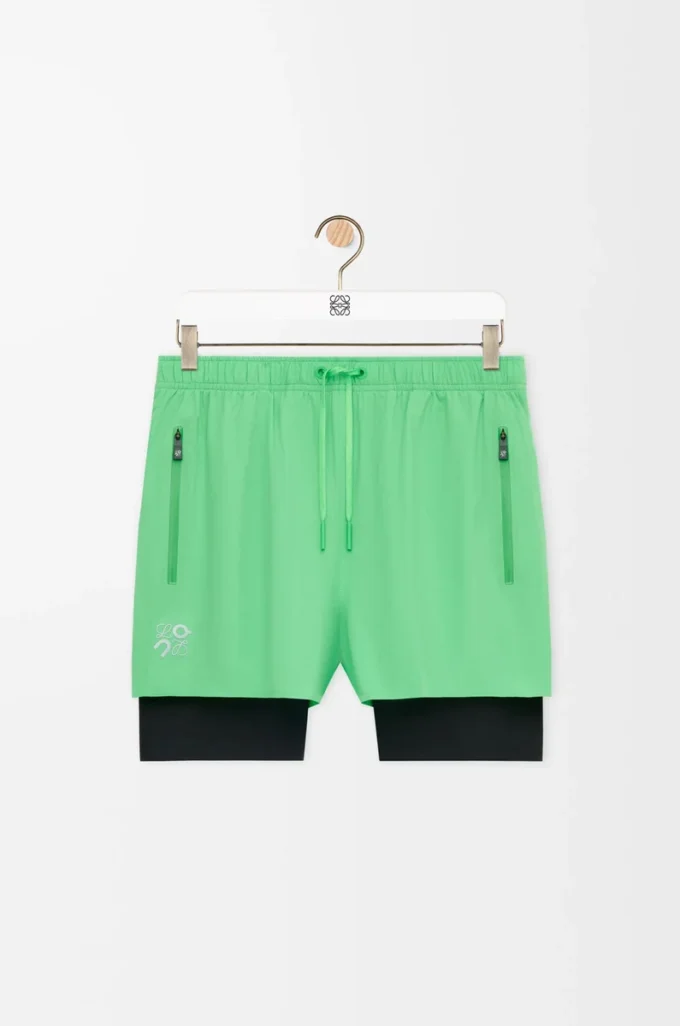 Pantalones cortos de alto rendimiento en tejido técnico verde Pantalones cortos de alto rendimiento en tejido técnico verde