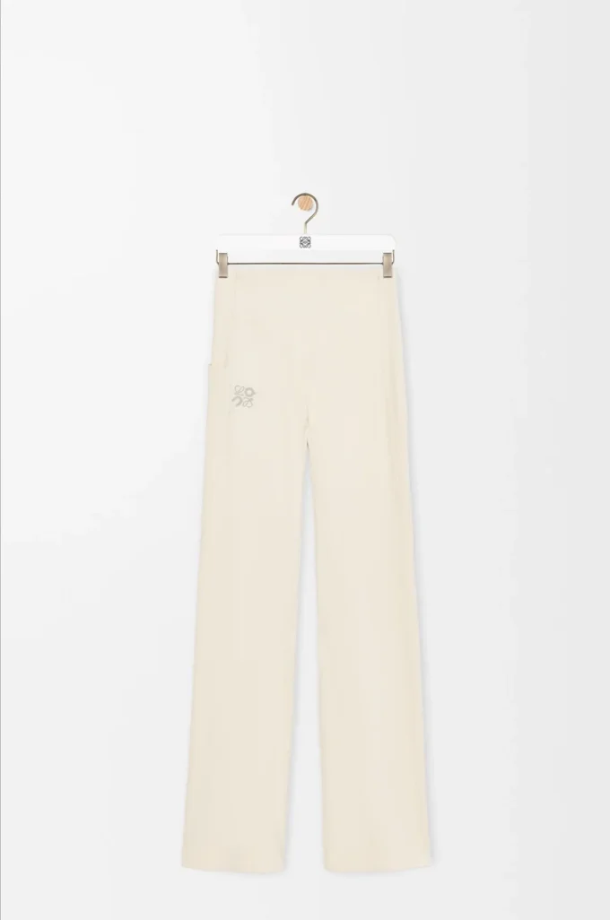 Pantalones suaves acampanados en jersey técnico marfil Pantalones suaves acampanados en jersey técnico marfil