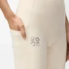 Pantalones suaves acampanados en jersey técnico marfil Pantalones suaves acampanados en jersey técnico marfil