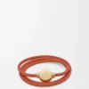 Pulsera Pebble de piel de becerro naranja/dorada
