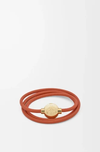 Pulsera Pebble de piel de becerro naranja/dorada