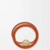 Pulsera Pebble de piel de becerro naranja/dorada