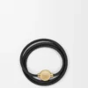Pulsera Pebble en piel de becerro negro/dorado Pulsera Pebble en piel de becerro negro/dorado